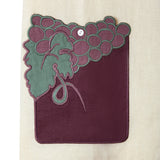 Close up of appliquéd and edge embroidered pocket