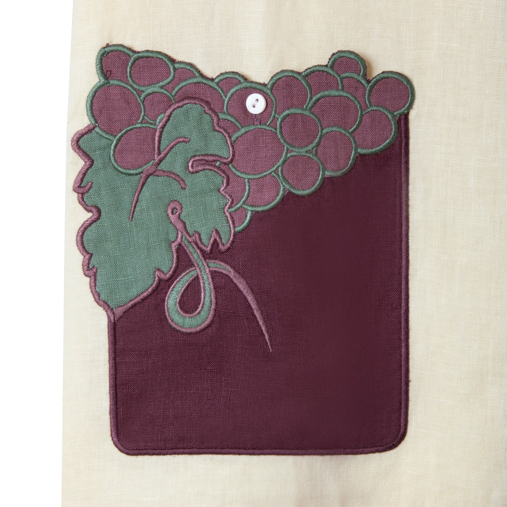 Close up of appliquéd and edge embroidered pocket