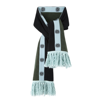 product photo of après ski scarf in green, light blue, and black with sun motif