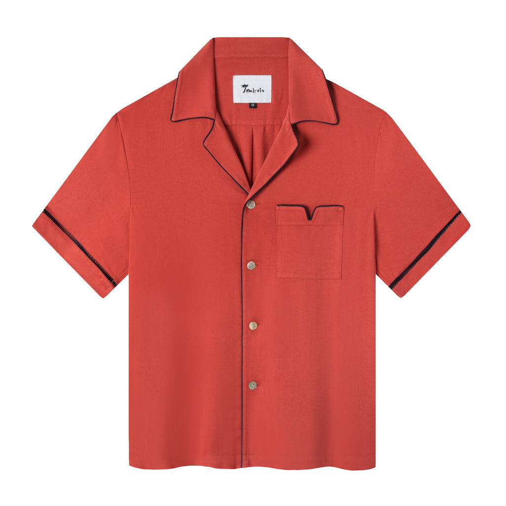 Front view of the valencia red Cabrisa shirt featuring black window pane embroidery on sleeves and black piping along the pocket and collar with four buttons down the front