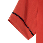 Close up view of black window pane embroidery