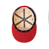 Inside of hat showing inner details including the floral ribbon connecting the seven panels