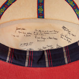 Inside of hat showing mock signatures from the likes such as Ronald Regan