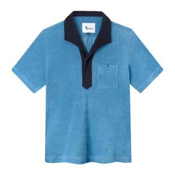 Front view of the blue polo with a navy collar
