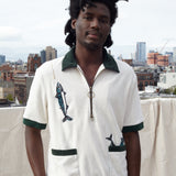 Male model wearing the cabana shirt on a rooftop in a city