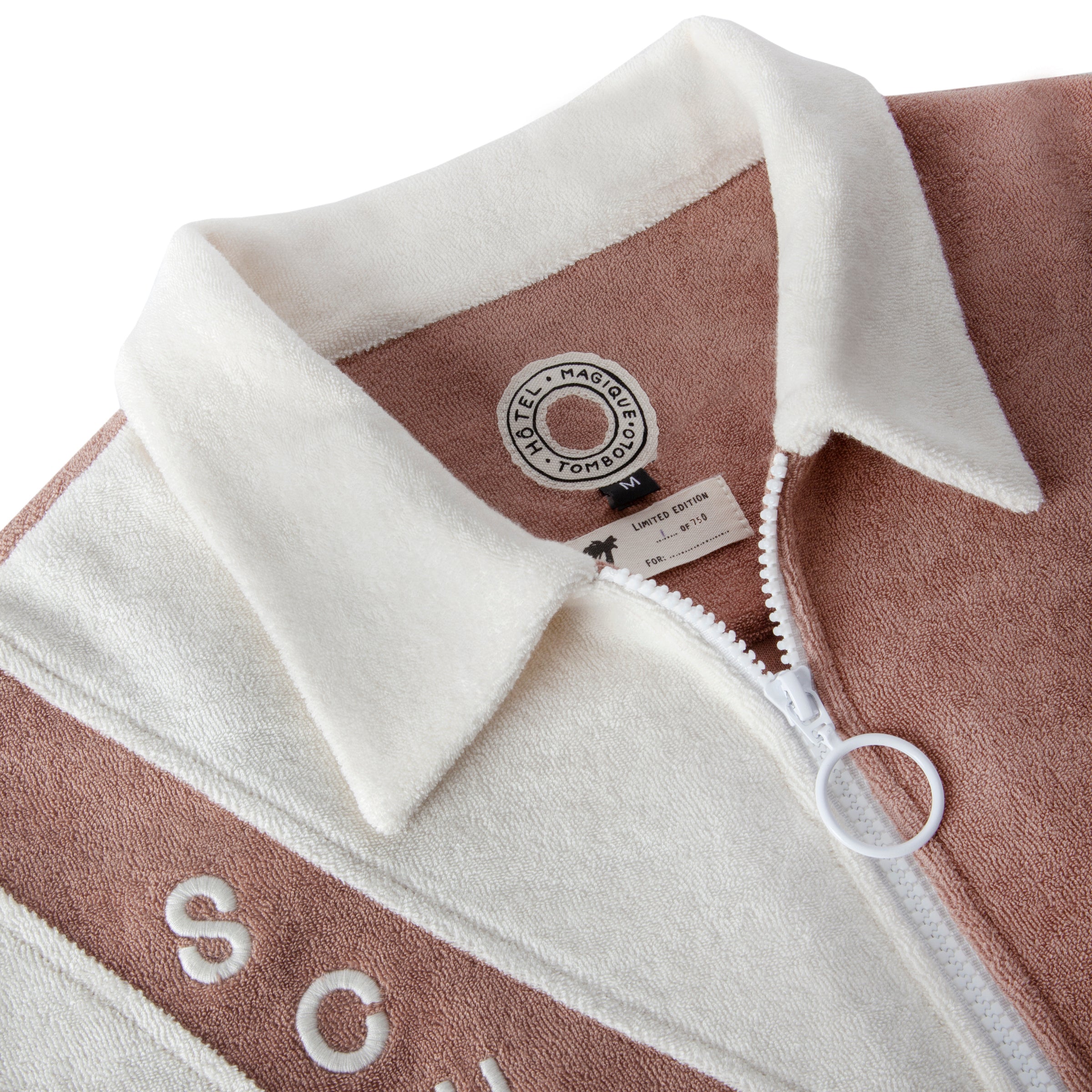 The matching pants and bucket hat complete this three-piece set made from 100% organic cotton terry cloth, featuring waves, fish, and 'SCUBA' embroidery.