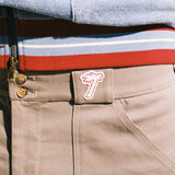 close up of tombolo logo on shorts