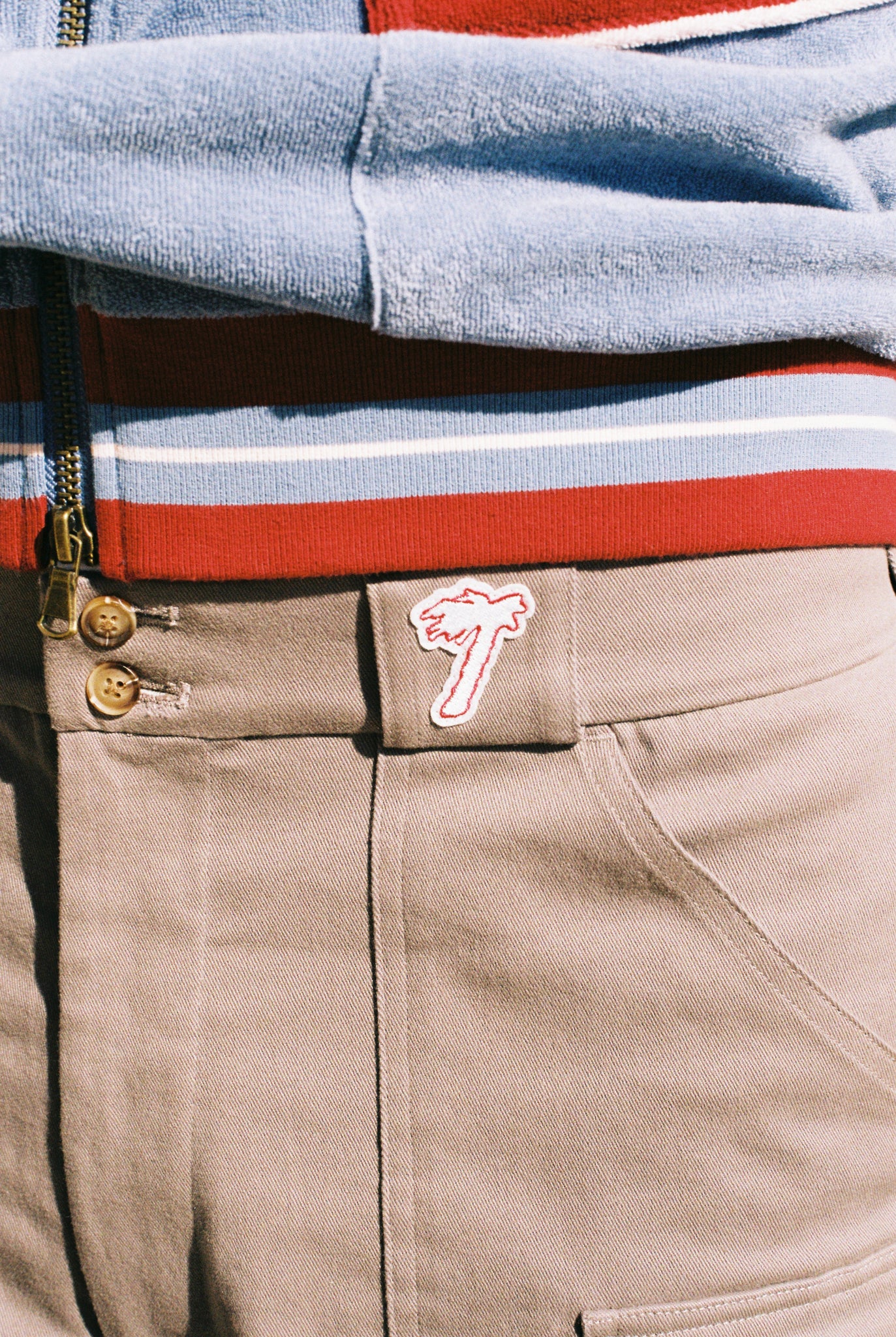 close up of tombolo logo on shorts