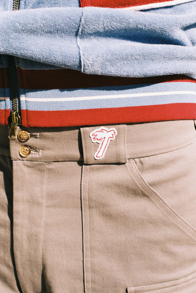 close up of tombolo logo on shorts
