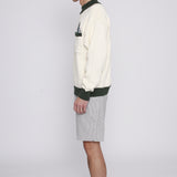 Side view of male model wearing the sweater