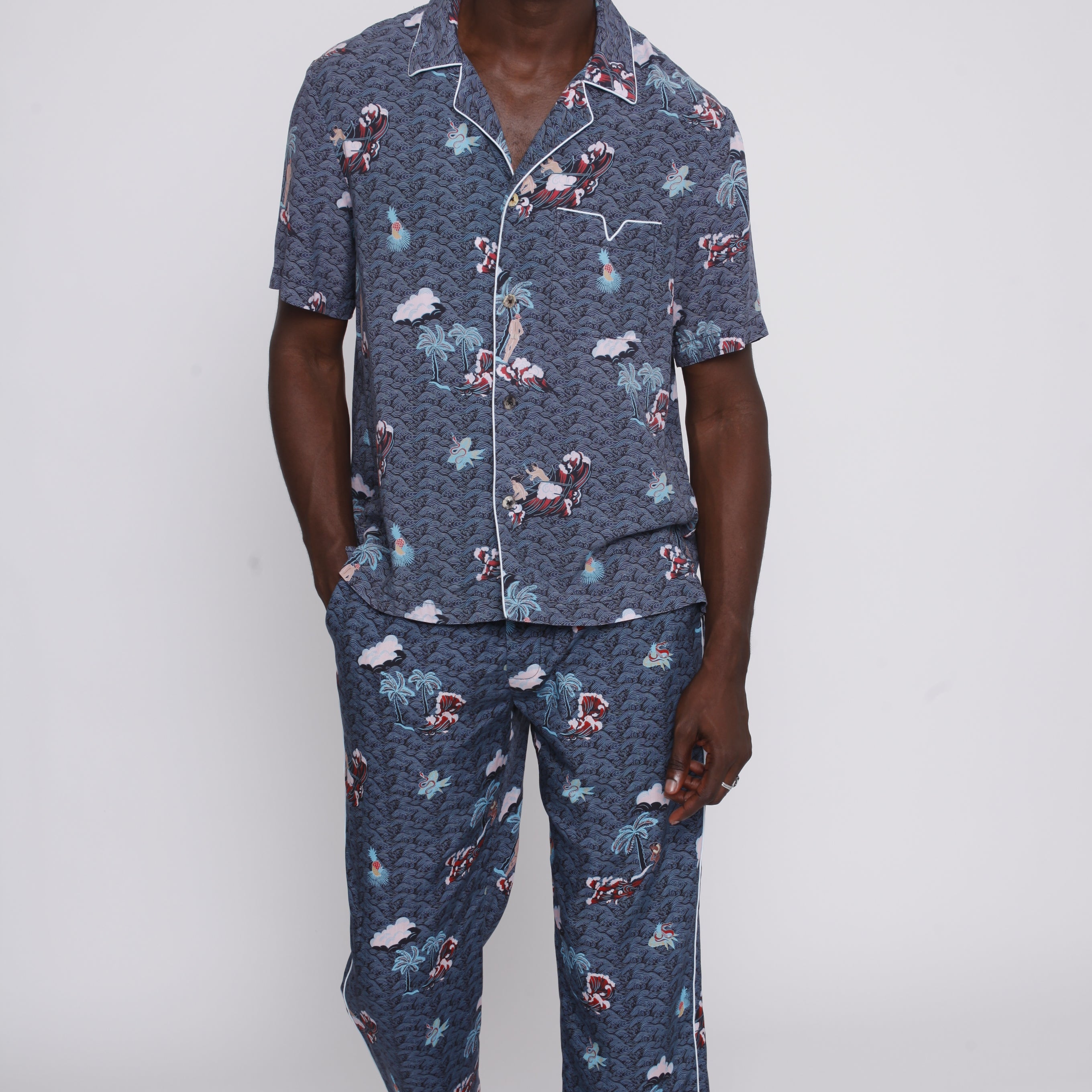 Male model wearing the full matching playa of eden set with pants