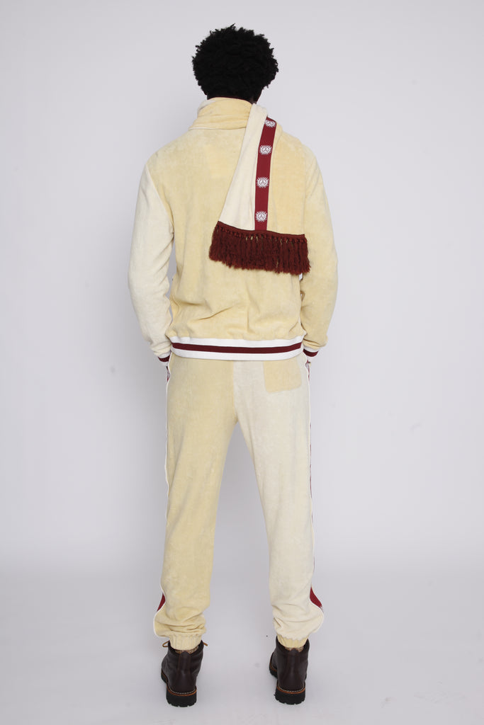 Back view of male model wearing full set plus scarf