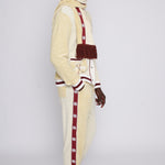 Male model in full apres ski cabana set looking over left shoulder in studio