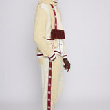 Male model in full apres ski cabana set looking over left shoulder in studio