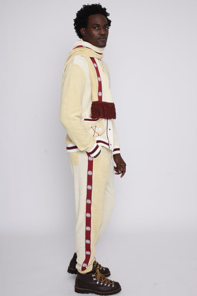 male model looking over left shoulder in après ski set