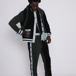 green long sleeve Tombolo ski outfit in terry cloth on a male model in photo studio