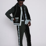 green long sleeve Tombolo ski outfit in terry cloth on a male model in photo studio