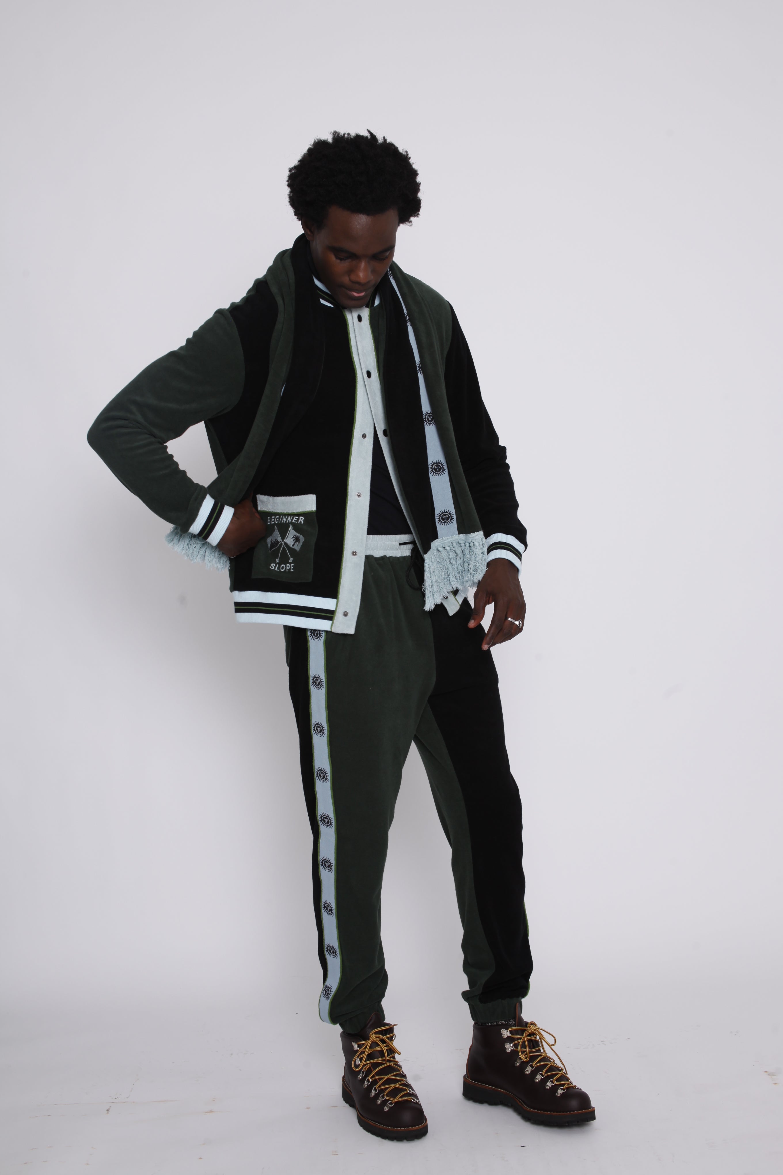 green long sleeve Tombolo ski outfit in terry cloth on a male model in photo studio