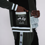 male model putting hand in left pocket embroidered with the words beginner slope