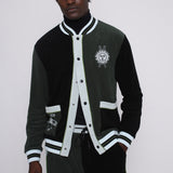 male model posing in this partially unbuttoned long sleeve terry cloth cabana shirt for stylish skiers