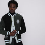 male model rubbing hands together in the full set in studio