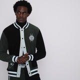 male model rubbing hands together in the full set in studio