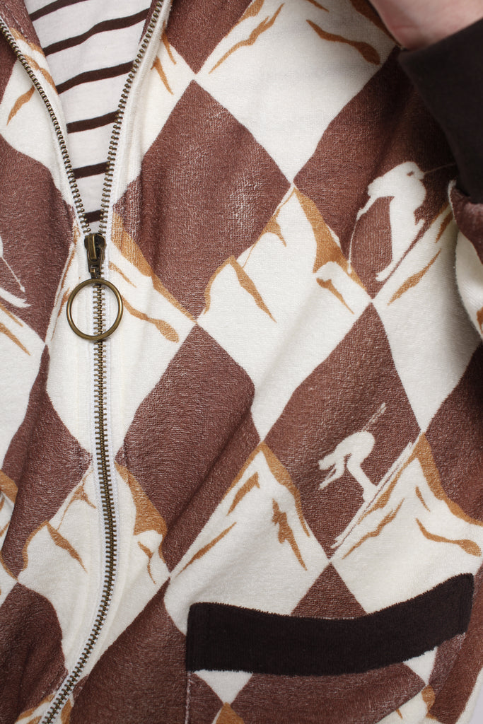 Close up of diamond pattern and skier motifs