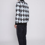 Back view of male model in same outfit now showing his birkenstock boston clogs