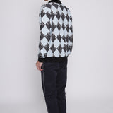 Back view of male model in same outfit now showing his birkenstock boston clogs