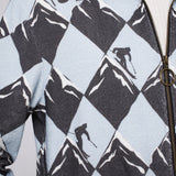 Close up of recurring skier print