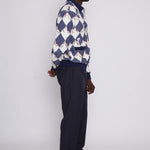 male model side view in cabana