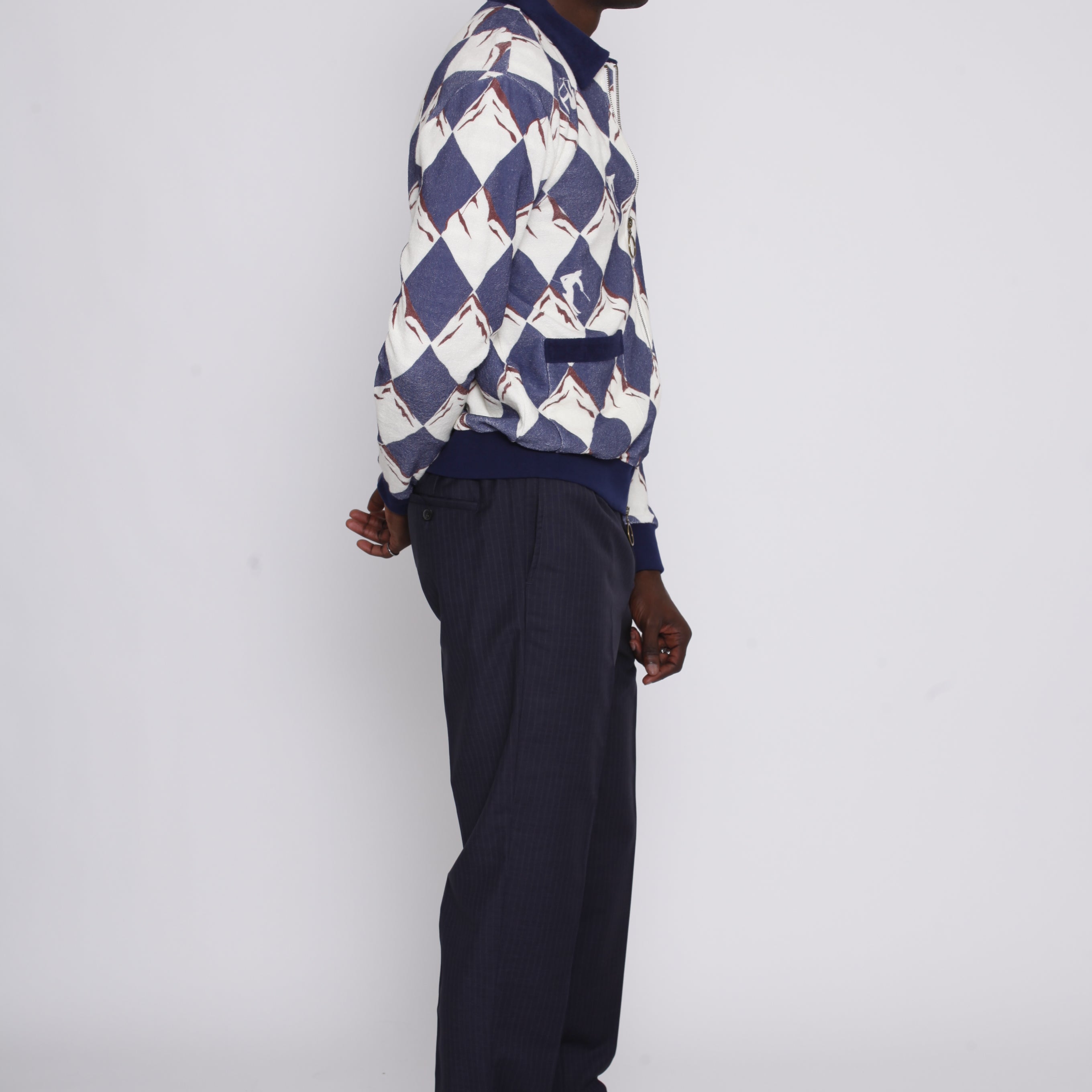 male model side view in cabana