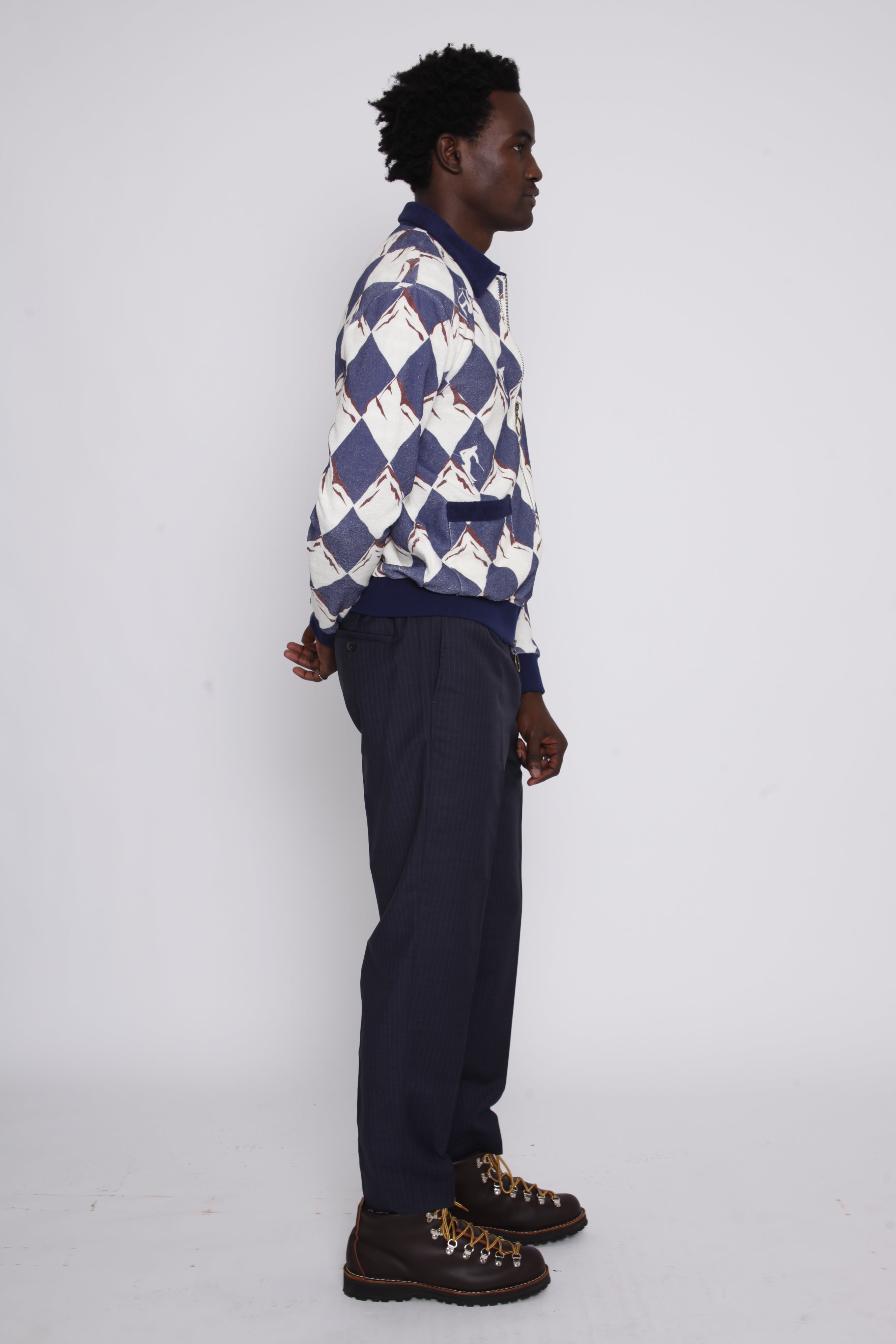 male model side view in cabana