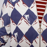 Close up of recurring skier print