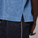 Close up of two inch side slit in shirt