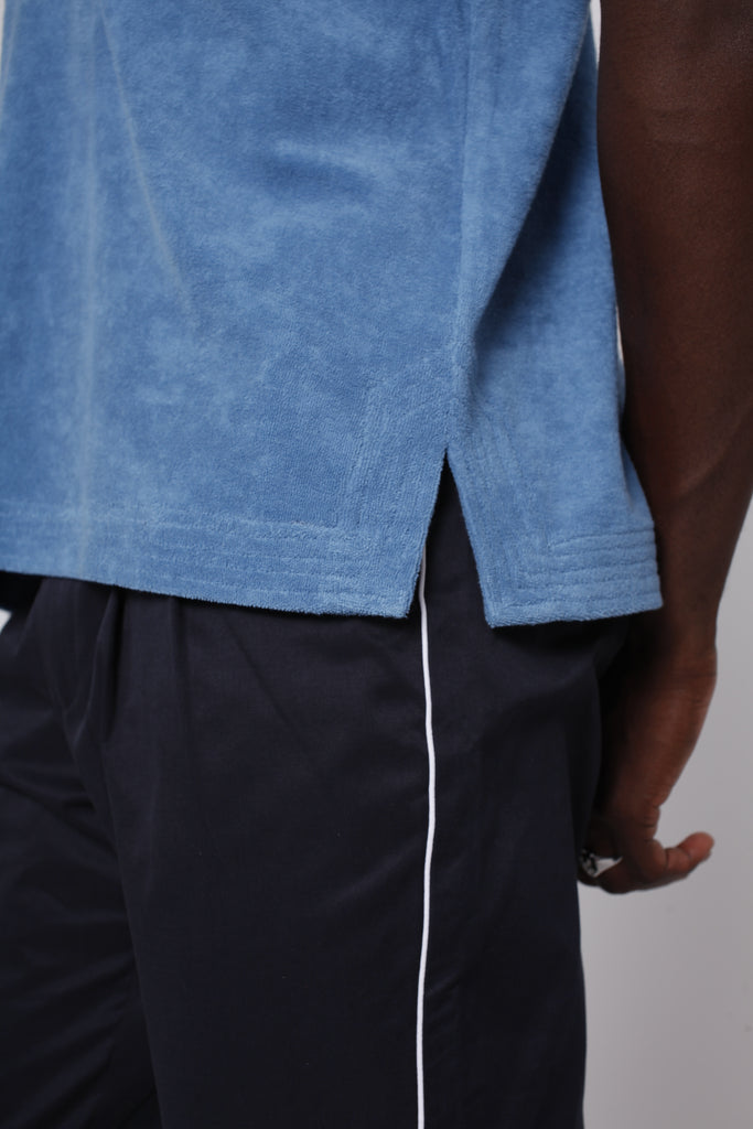 Close up of two inch side slit in shirt