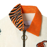 Tiger print collar, tiger and ivy leaves make up this playful full zip terry cloth shirt 
