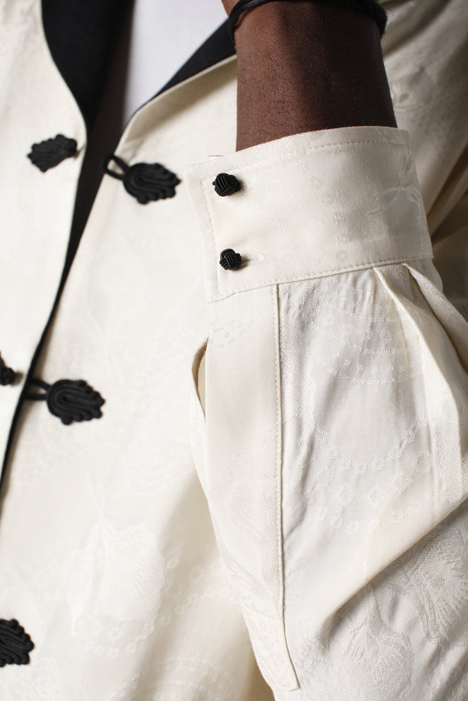 Close up of knotted sleeve clasps