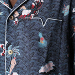 close up view of pocket with light blue piping