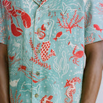 Another close up of the model wearing the shirt with a better view of the pocket