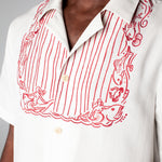 Close up of bib embroidery on male model