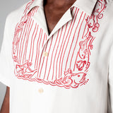 Close up of bib embroidery on male model