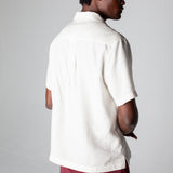 back view of male model wearing the trunks with the matching top