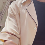 Video of female model wearing navy cabrisa walking around on the street