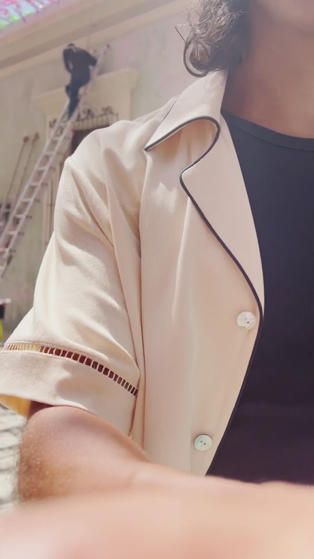 Video of female model wearing navy cabrisa walking around on the street