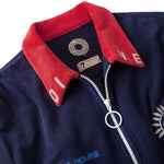 Close up of dive embroidery on collar, letters D and I on left side and V and E on the right