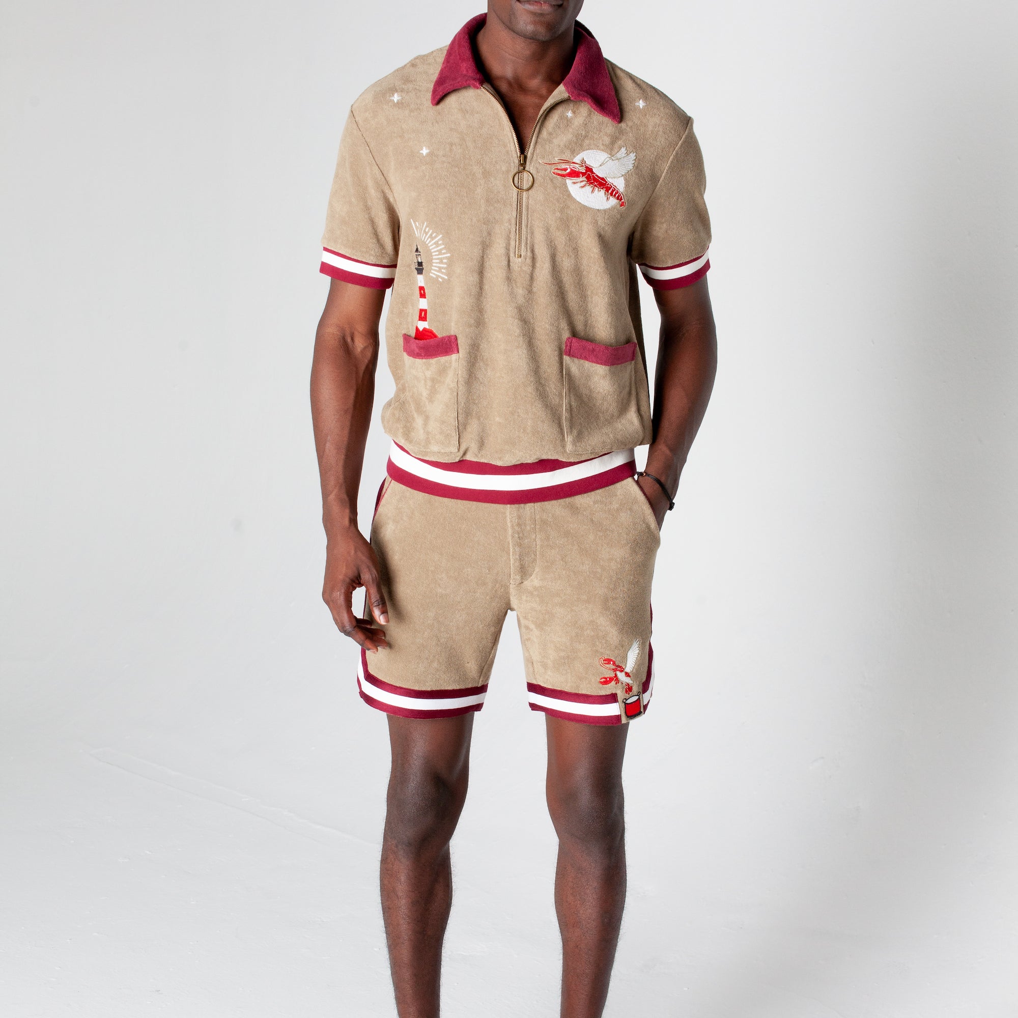 organic cotton terry cloth with embroidered lighthouse and lobster motifs in a matching set