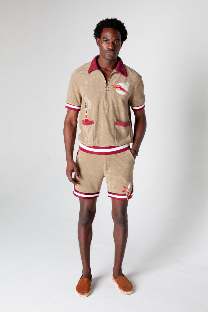 organic cotton terry cloth with embroidered lighthouse and lobster motifs in a matching set