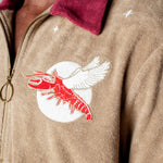 fun playful lobster motif embroidered into organic cotton terry cloth eclipsing the moon amidst a starry night perfect for day or night