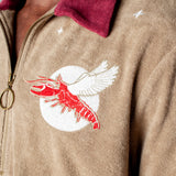 fun playful lobster motif embroidered into organic cotton terry cloth eclipsing the moon amidst a starry night perfect for day or night